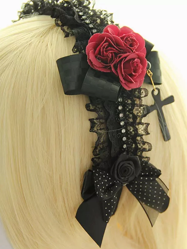 Rear back view lolita headband on mannequin showing full length layered black lace polka dot bows red roses cross pendant rhinestone strip details