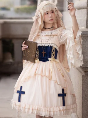 Complete classic Lolita coordinate featuring lace headdress paired with apricot navy OP dress, cross embroidery details, and ruffled lace trims worn by model in vintage European outdoor scene front view