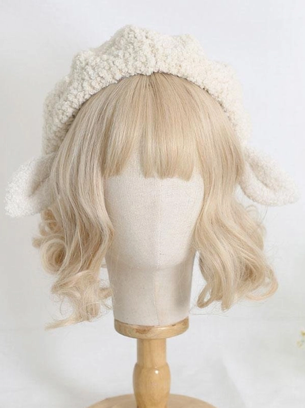 Left side profile of plush pink-tipped sheep ears lolita headdress worn on mannequin, showing ruffled beret brim and fuzzy fleece fabric texture, cute lolita fashion hat accessory