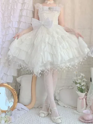 Sweet Lolita fairy tale dress with square neckline and cascading ruffles, model lifting skirt hem to display tiered layers