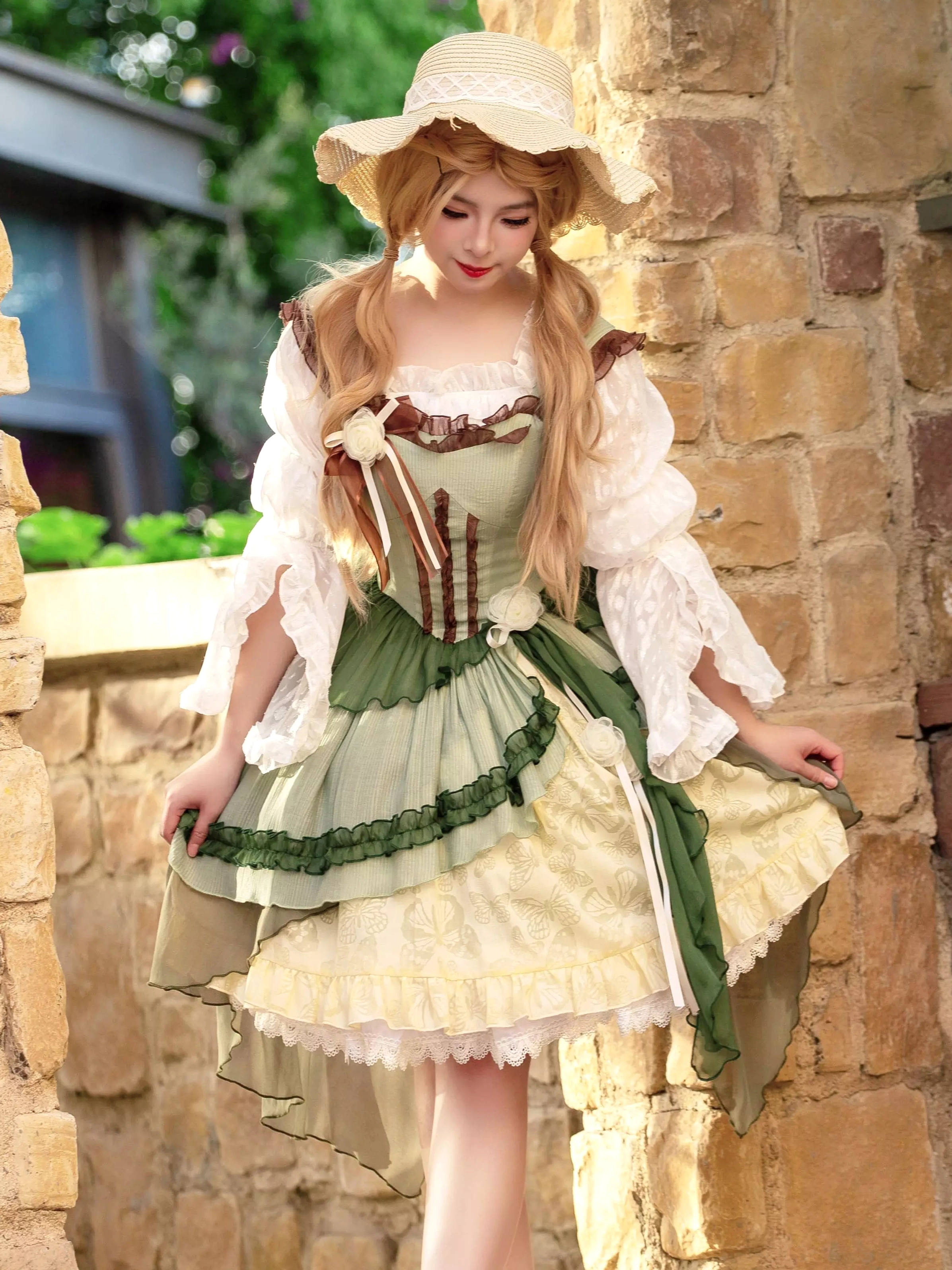 Lolita JSK dress side front view showing lace-trimmed inner blouse and cream underlayer details with model wearing straw sun hat