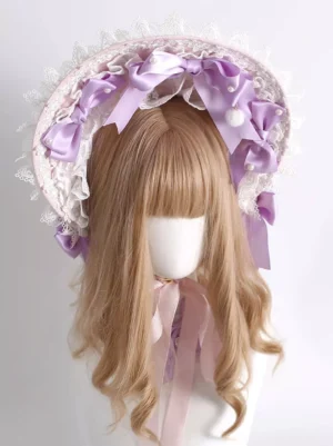 Lolita bonnet headdress close-up showing multi-layer white lace clustered purple satin bows and tiny white pom-pom details