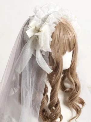Elegant lolita lace headdress with ruffled off-white lace, satin bow accents, and sheer tulle veil shown from left side profile view on mannequin with light brown curly bangs wig
