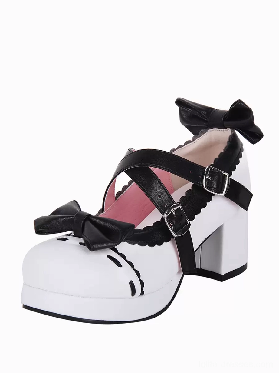 Single white Lolita Mary Jane heel shoe three-quarter front view featuring dual black buckle straps, toe and heel bows, pink insole visible, stable platform block heel