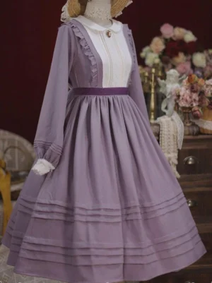 Romantic lolita one-piece dress with mauve purple fabric, peter pan collar, velvet waistband and intricate pleated skirt details - front three-quarter angle view