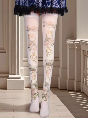 Sheer white over-the-knee lolita stockings featuring pink floral and retro decorative prints paired with navy frilly skirt front view