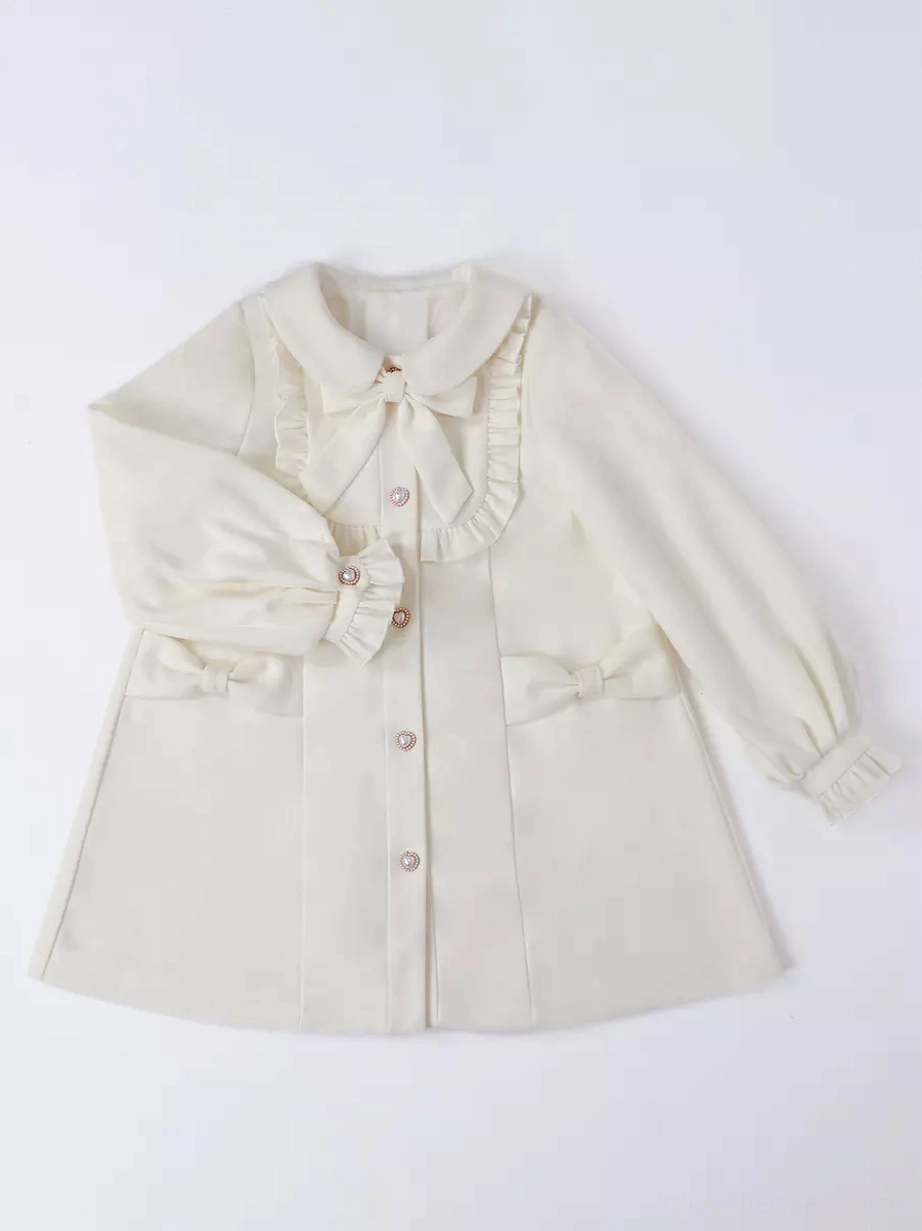 Close-up top-down view of lolita overcoat collar detail featuring large fabric bow, ruffled collar trim, and soft fuzzy fabric texture