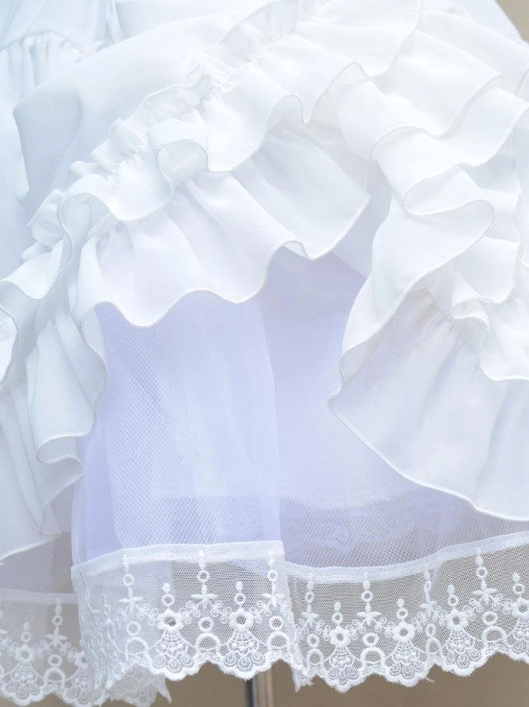 Close-up detail of Lolita petticoat sheer mesh lining embroidered lace hem satin frills ruffled construction side overhead view
