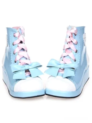 Pair of Lolita platform ankle boots front three-quarter view pink ribbon shoelaces blue bow heart-shaped heel ornament cute adorable