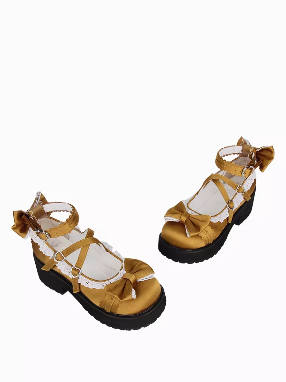 Lolita platform shoes rear view displaying front bow embellishments heart-shaped buckles black non-slip outsole