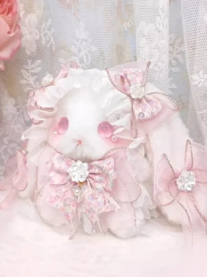 Rococo Lolita rabbit bag three-quarter angle view showing layered pearl bows side decoration extra bow accents tulle chest details