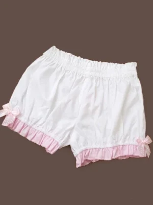 white-lolita-pumpkin-bloomers-polka-dot-pink-bows-ruffled-leg-openings-front-facing-flat-lay