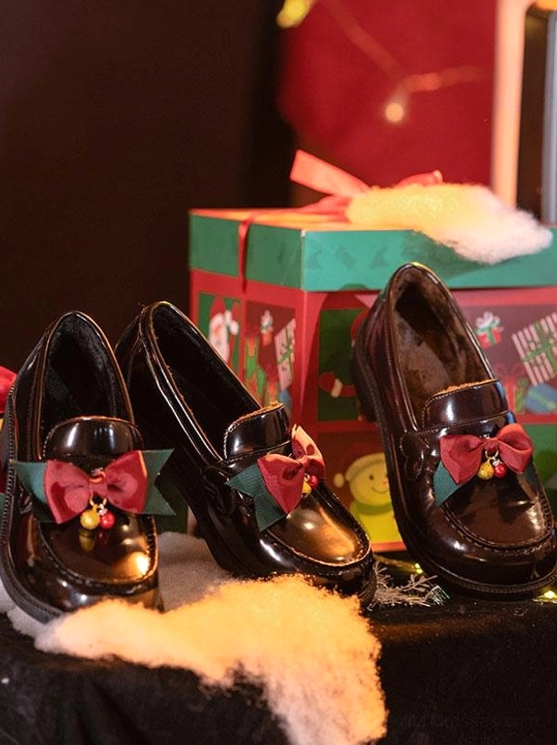 Lolita pumps overhead still life arrangement three pairs with christmas gift boxes fur padding festive bow bell decoration