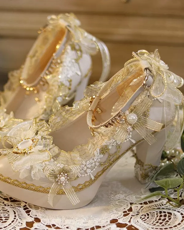 Lolita pumps sheer ribbon bows pearl decorations gold trim details romantic front three-quarter angle