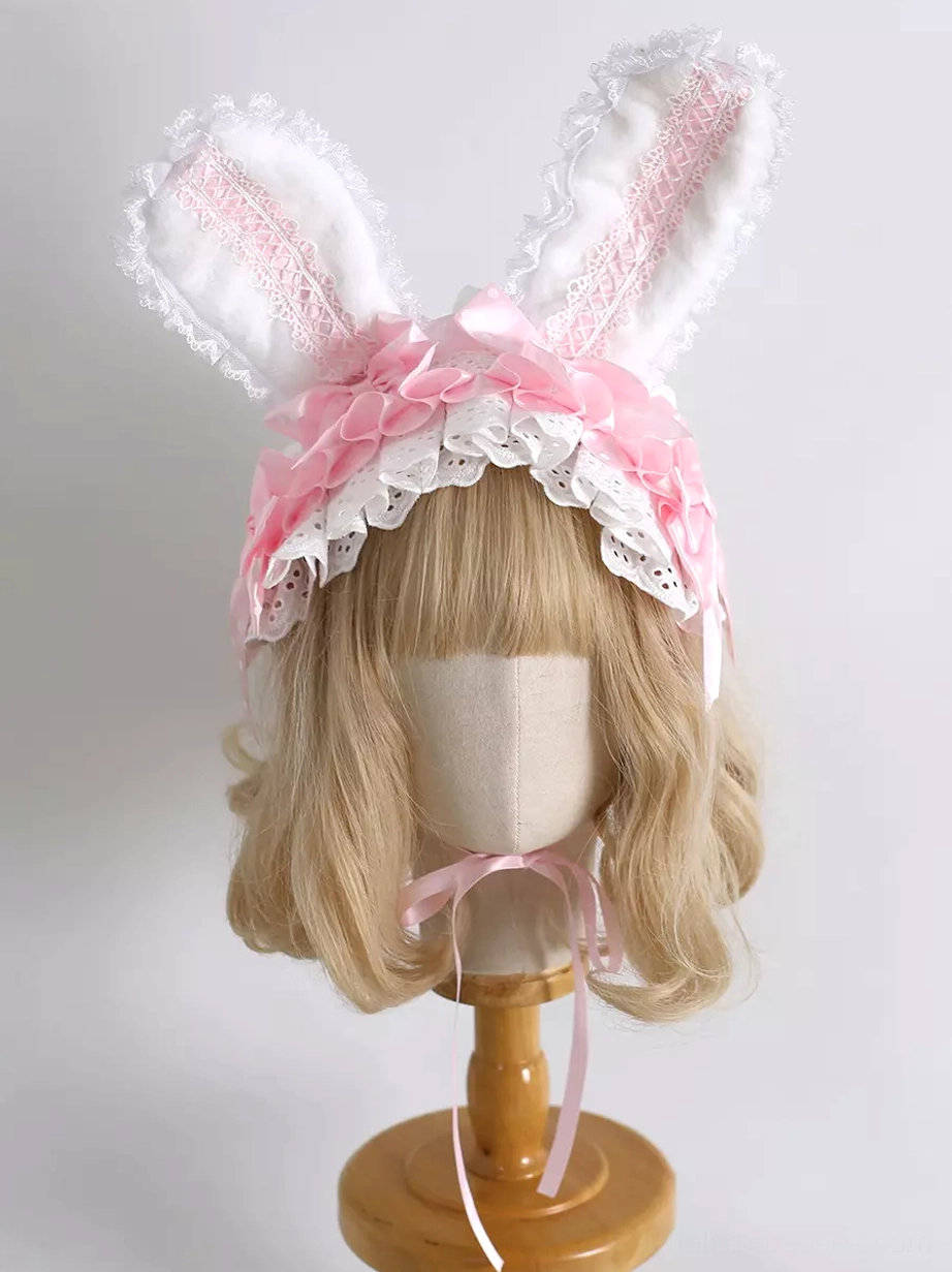 Monochrome pink lolita bunny ear hairband with plain pink inner ears front view on mannequin