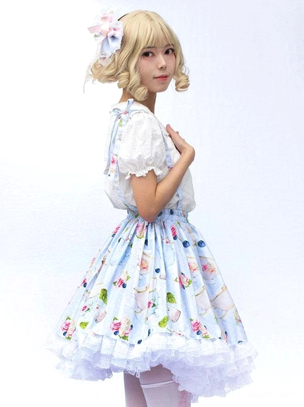 Sweet lolita skirt set with fitted waist ruffled hem doll collar white blouse side view on white background with hair accessory