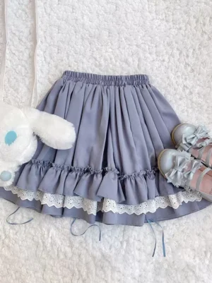 Sweet lolita skirt gray-blue ruffles flat lay top-down view elastic waistband lace-trimmed hem drawstrings plush toy bow shoes styling
