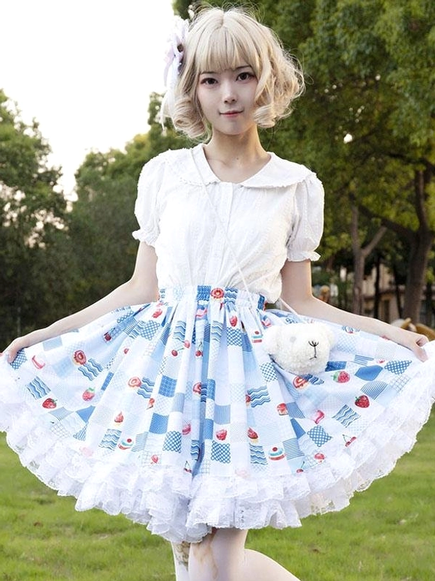 Flared lolita SK skirt low angle front full shot outdoor grassy park blue grid fruit prints layered white lace ruffles hem