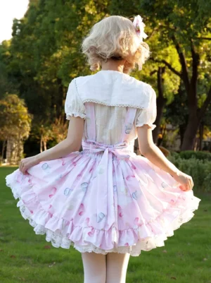 lolita skirt back view showing large waist bow sash and layered ruffled lace hem detail outdoor photography