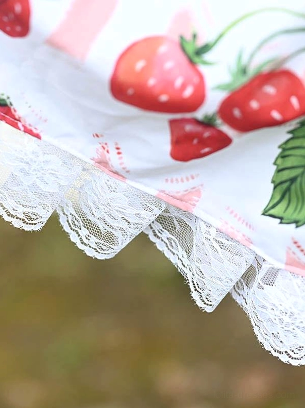 strawberry print lace trim skirt flat view close up fabric red fruit leaf motif ruffled edge