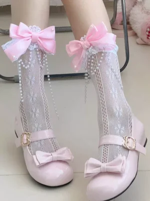 Lolita decorative socks with pink bow pearl pendants and lace cuff trim shown on model wearing pink lolita shoes oblique top view