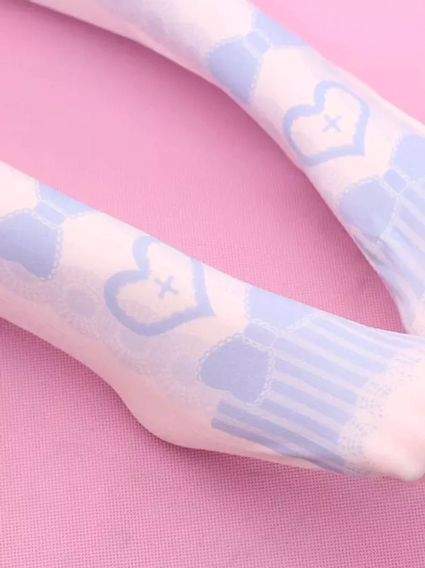 Detailed close-up of lolita socks heel area showing striped reinforcement and blue heart bow prints, demonstrating quality construction and design elements