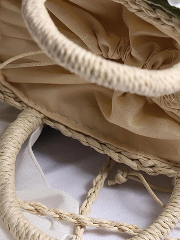 Lolita straw bag close-up thick woven rope handles soft inner lining construction quality detail