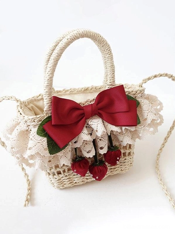 Interior compartment of lolita straw handbag at eye level, displaying lined interior space with capacity for mobile phone and essentials, showing drawstring closure mechanism