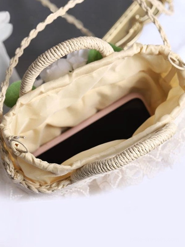 Lolita straw bag interior view beige fabric lining rope handles drawstring strap smartphone storage capacity