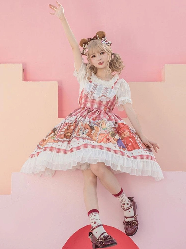 Lolita sleeveless dress full front view with raised arm showing ruffled skirt hem white lace trim and matching pink socks mary jane shoes