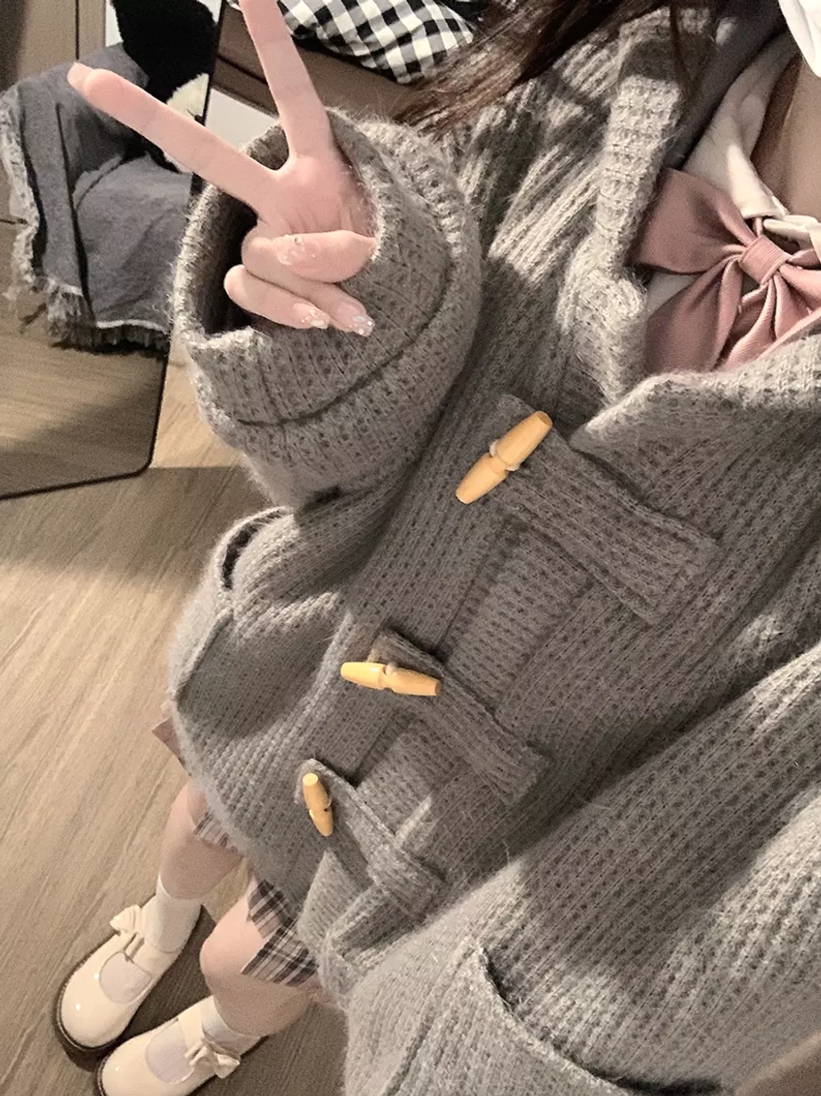 lolita toggle coat waffle knit polyester construction detail showing horn button closures and hooded drawstring design