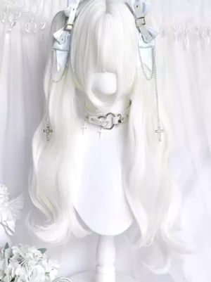 Lolita twin curly pigtail wig styled with light blue bows, cross pendant chains, and heart buckle choker on white mannequin, front view demonstrating coordinate styling possibilities and bow placement