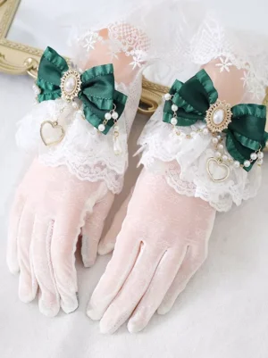 Dark green satin bow Lolita velvet gloves with white lace trim and pearl heart decorations - overhead product photography