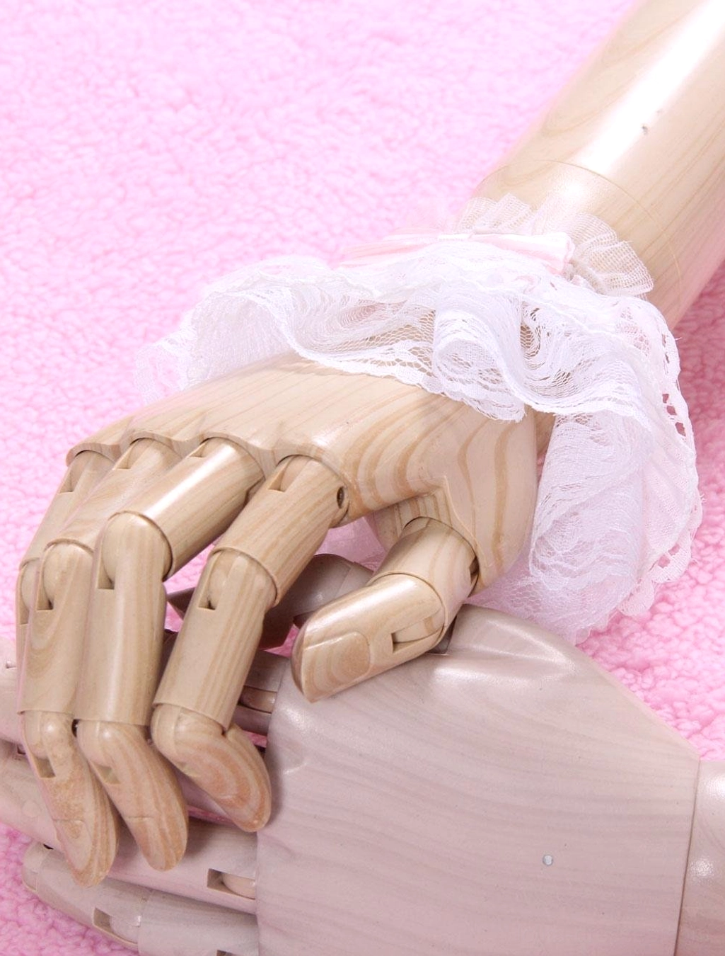 lolita white lace wrist accessory overhead side view with layered ruffle frills on mannequin hands