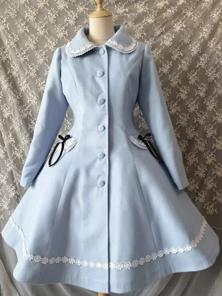 Light blue sweet lolita coat front display showing lace-trimmed doll collar, front button closure, black ribbon pocket detail, and lace hem trim