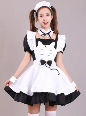 Cat-themed maid Lolita dress front three-quarter perspective showing waist bow with tail decoration, ruffled apron trim, complete ensemble with matching maid accessories