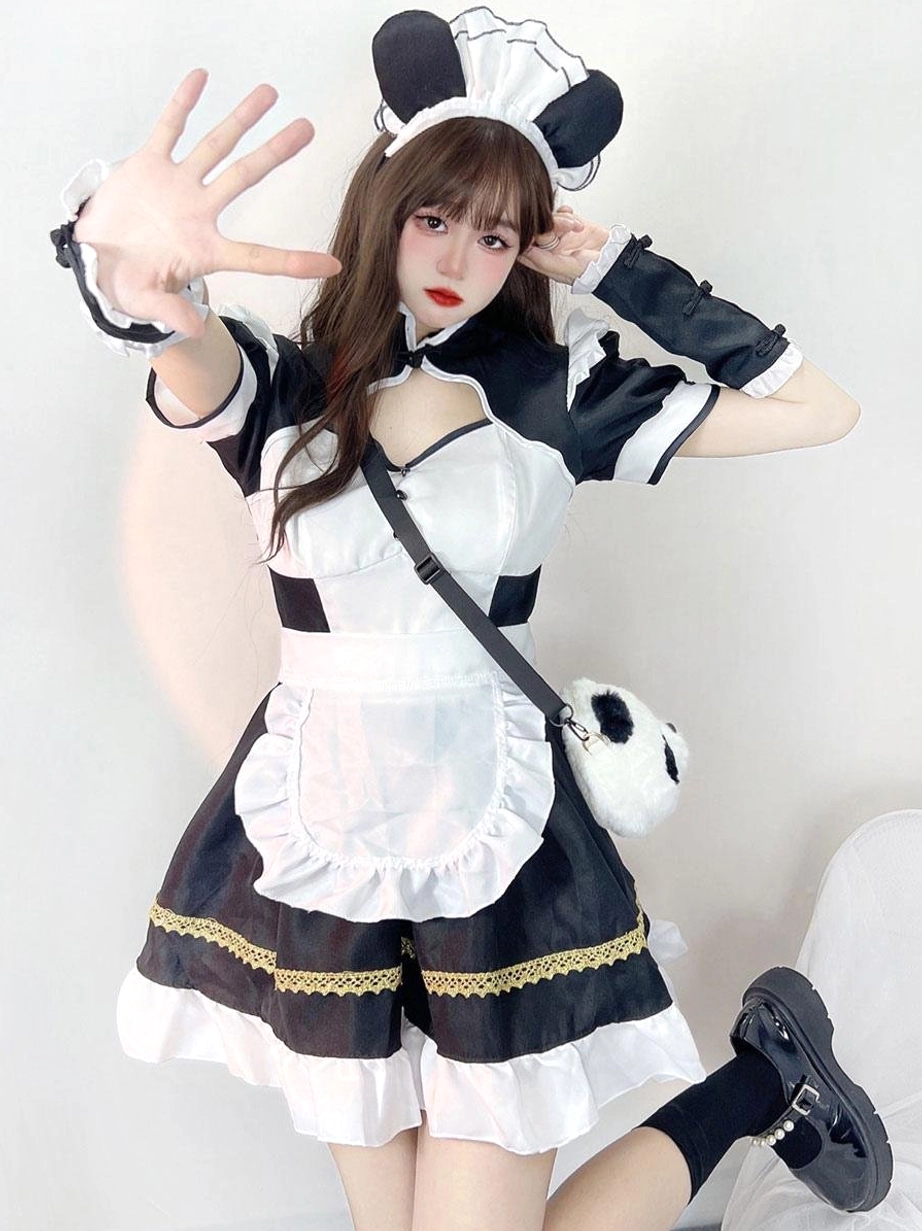 Maid lolita costume dress with cutout neckline black leather shoes white socks - low-angle frontal pose