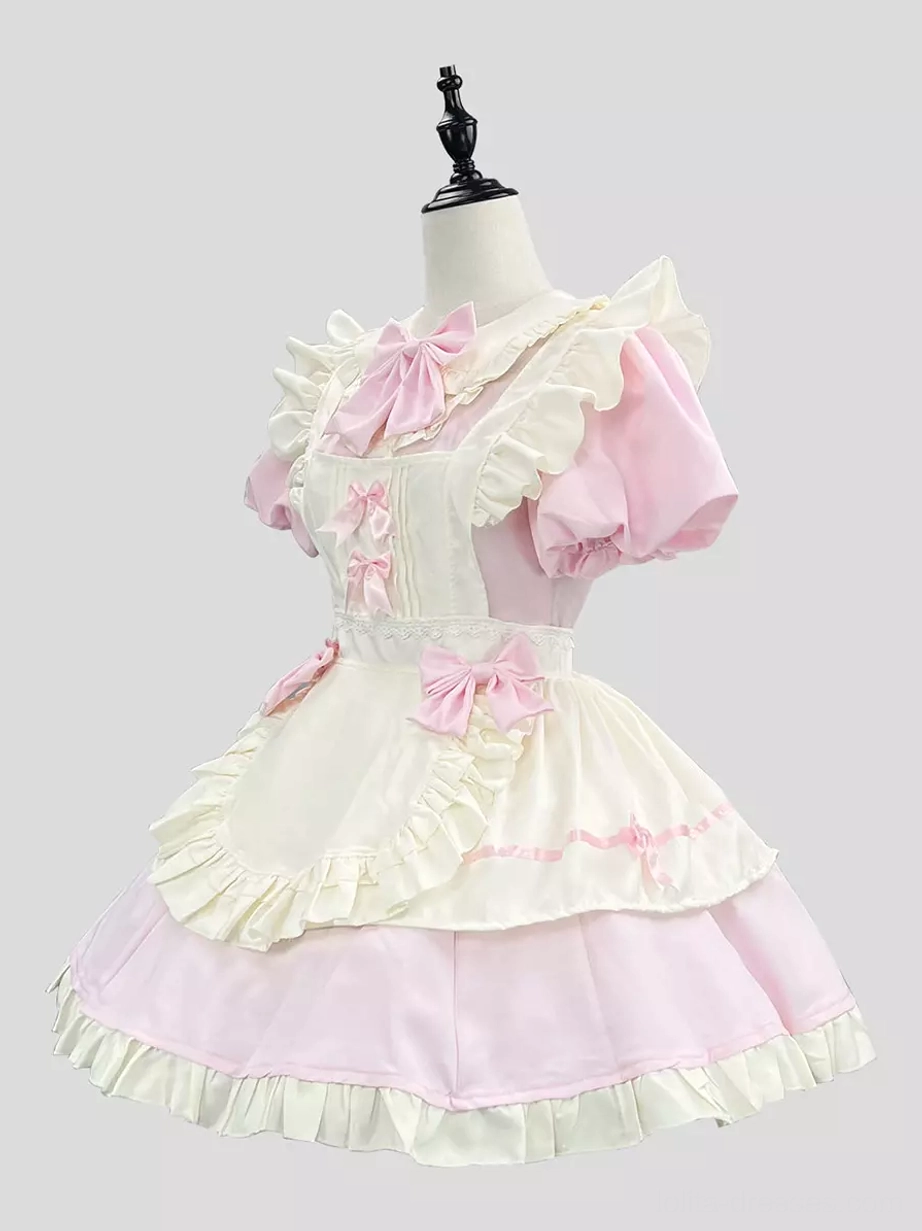 Pink white maid lolita dress side front view on display form showing ruffle trim and bow details