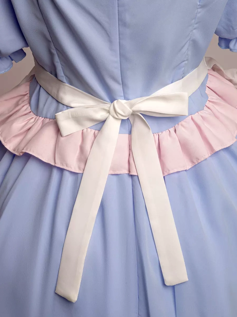 Maid Lolita dress costume set detail showing fabric texture and ruffled embellishments