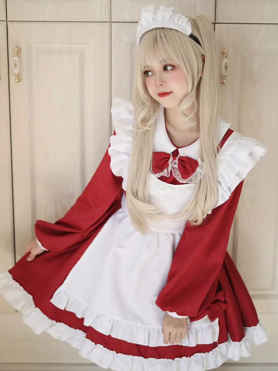 Maid lolita dress showing back detail waist bow construction and ruffled skirt hem detail