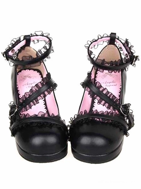 Matte black Lolita chunky heel shoes front view, featuring crisscross lace-trimmed ankle straps, metal buckle fasteners, and round toe design, studio photography on white background