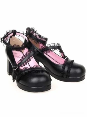 Pair of matte black Lolita chunky heel shoes three-quarter oblique view, displaying block high heel structure, cross-over lace-trimmed straps, ankle buckles, and full shoe design from side angle