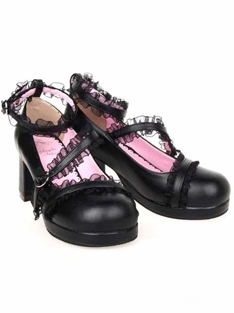 Pair of matte black Lolita chunky heel shoes three-quarter oblique view, displaying block high heel structure, cross-over lace-trimmed straps, ankle buckles, and full shoe design from side angle