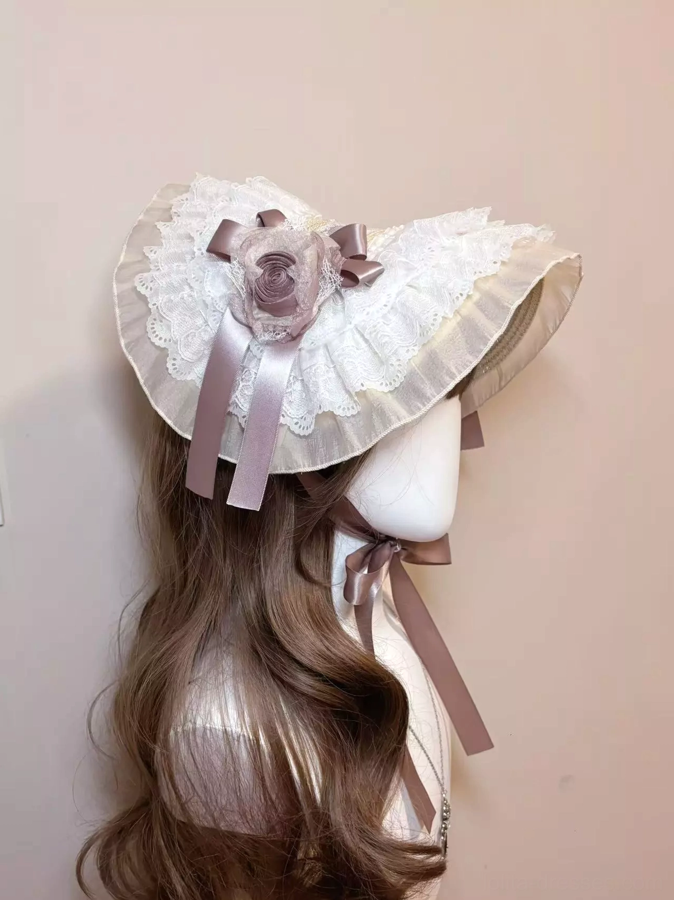 Elegant mauve rose garden lolita bonnet headdress with white scalloped lace trim and satin ribbon ties displayed on mannequin side back view showcasing layered lace frills and delicate floral bow embellishments