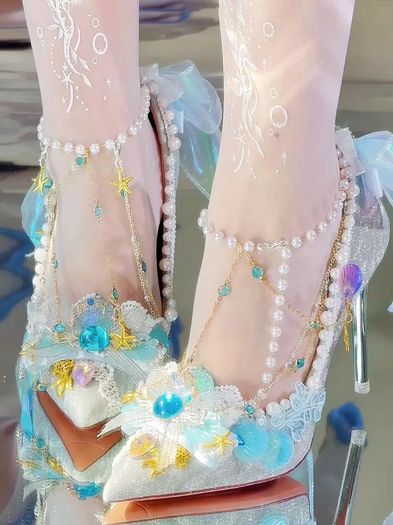 Mermaid Lolita pointed toe pumps front view model wearing ocean patterned sheer stockings pearl ankle chain maritime themed heels