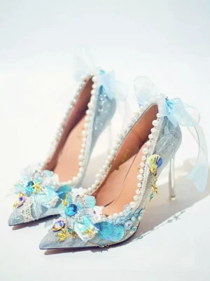 Sweet Lolita mermaid pumps silver glitter finish blue floral ocean embellishments pearl edging tulle heel bow flat lay photography