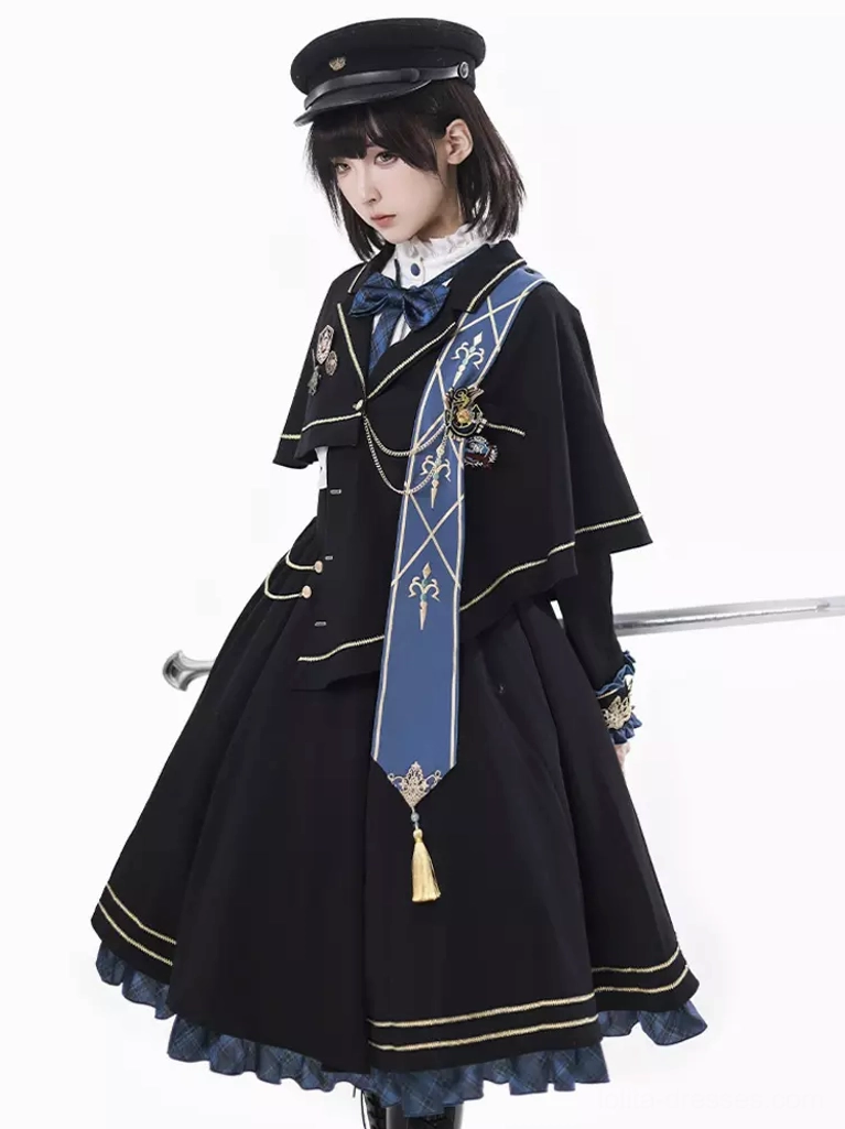 Military Academy Lolita dress three-quarter side view black plaid ouji style blue hem ruffles white lace collar cape cloak dramatic silhouette