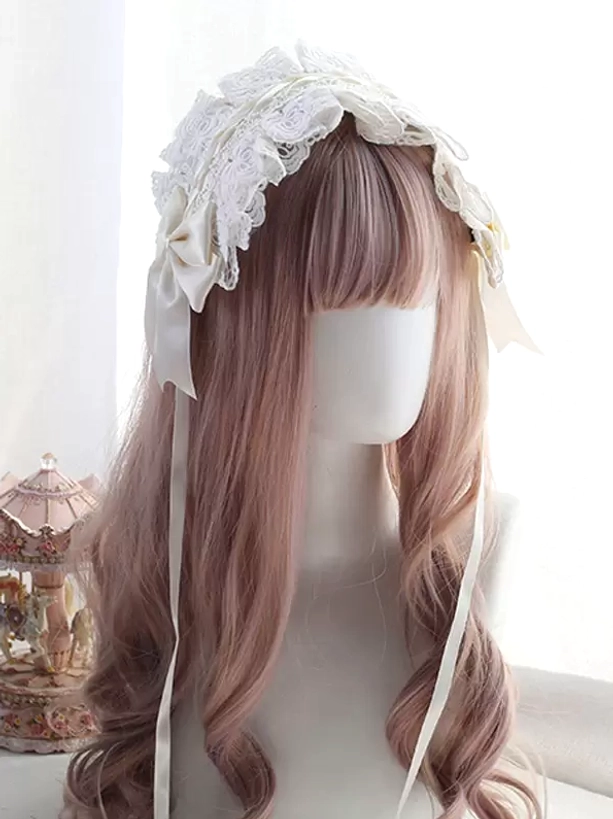 Minimalist Lolita lace headband featuring all white ruffled lace with small off-white side bows and long plain ribbon tails, displayed on mannequin with pink wavy hair against vintage carousel decor, three-quarter front view