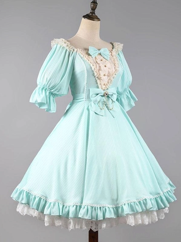 Mint green sweet lolita dress mannequin display showing puff sleeves square neckline and ruffled skirt