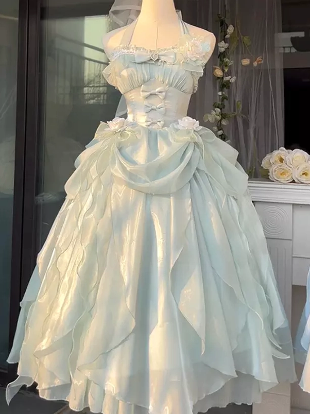 Mint green satin lolita dress halter tie-up neckline with lace collar corset waist detail dress form indoor window flat lay showcase